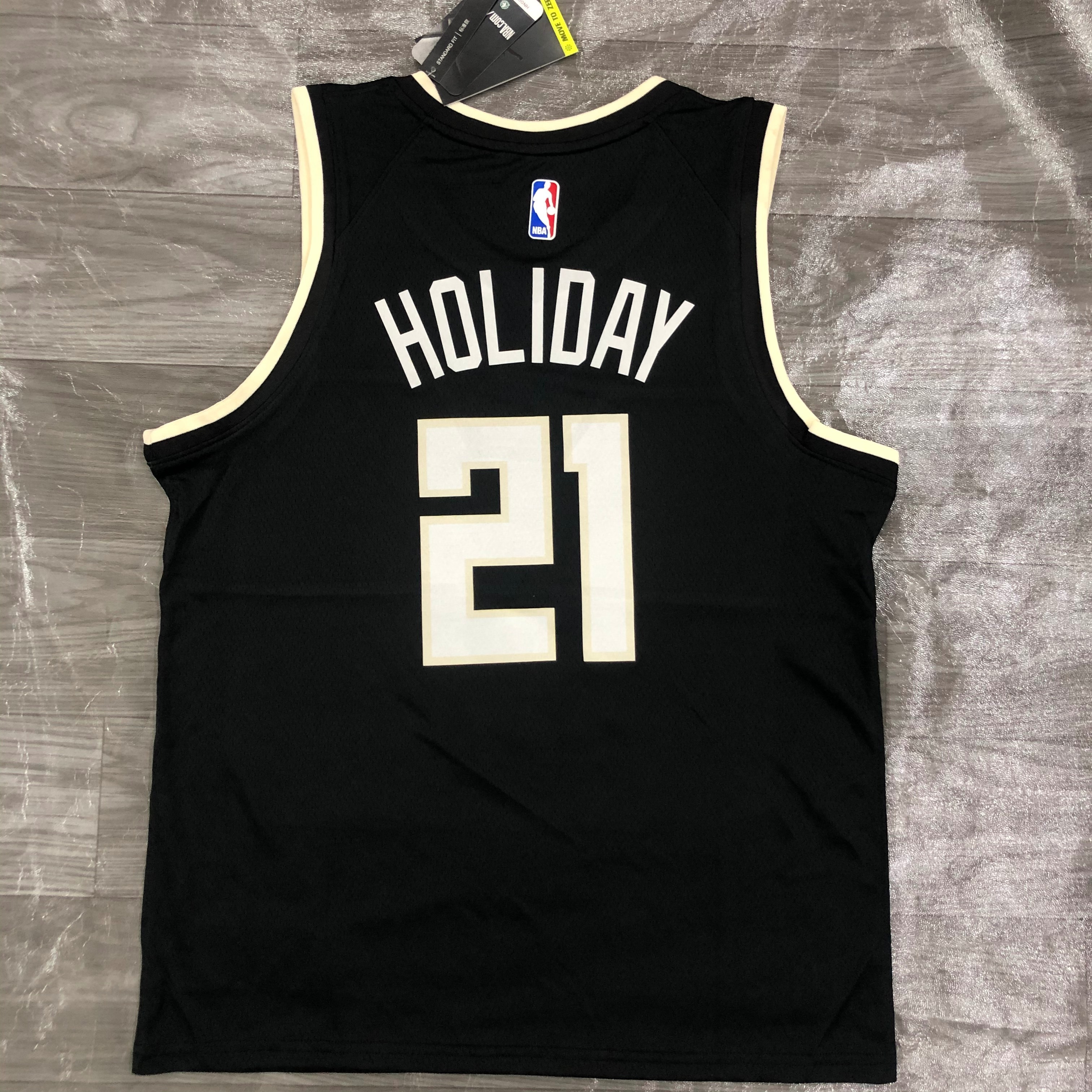 NBA Men Season 2021 Milwaukee Bucks Black #21 HOLIDAY Jersey with Jordan Logo High Quality Name and Number Print - leoleo123123